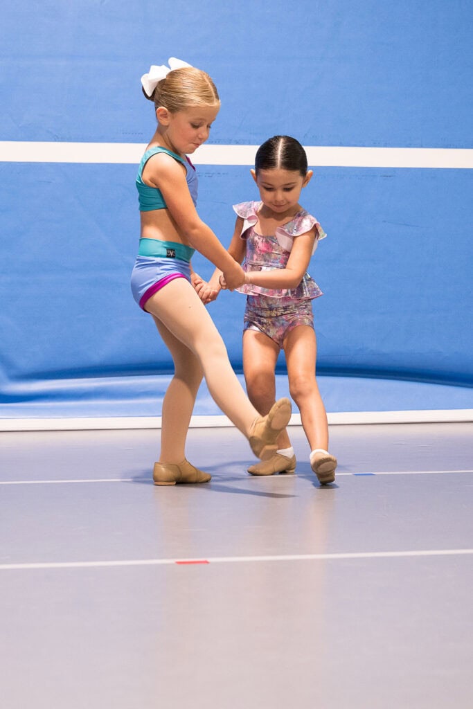 Two elementary age dancers in dance studio in Cedar Rapids