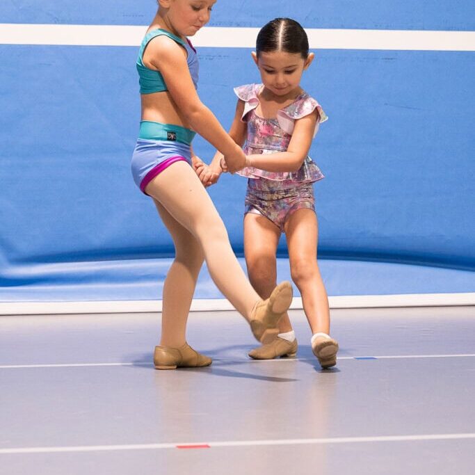 Two elementary age dancers in dance studio in Cedar Rapids